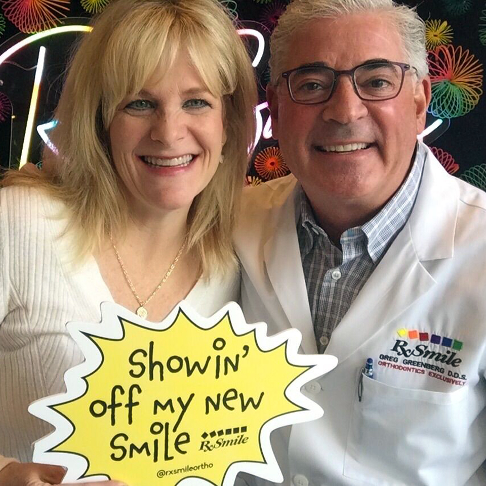 RxSmile Frisco Orthodontics patient showing off new smile after braces removal